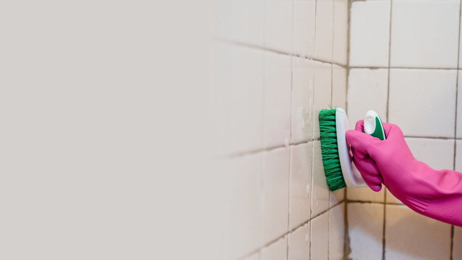 Bathroom Mold Removal Cary NC 1 Bathroom mold removal in Cary NC: technician cleaning a shower