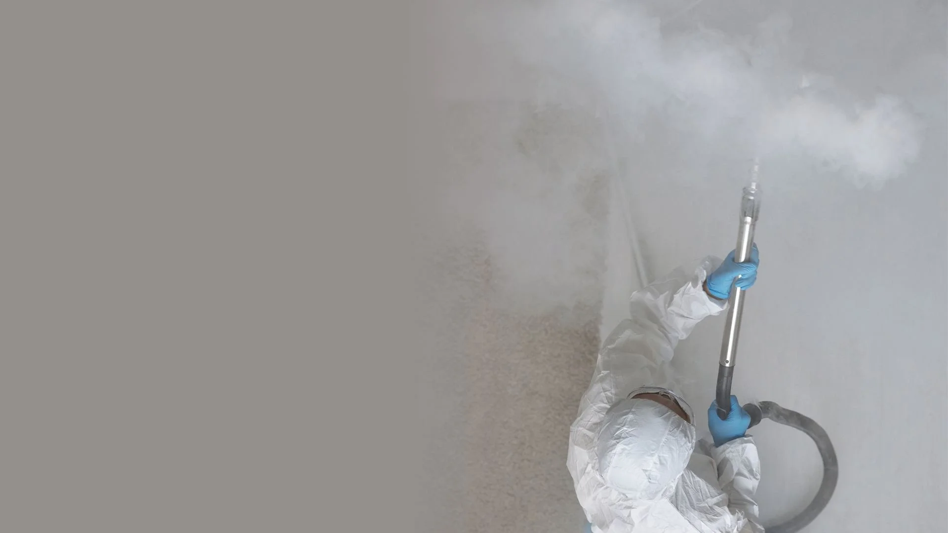 Mold remediation in Cary NC: technician treating a room